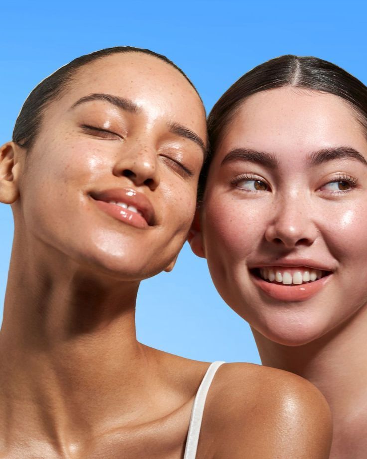 Two women with healthy-looking skin side by side